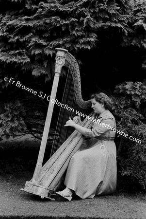 EILEEN MC CABE PLAYING HARP